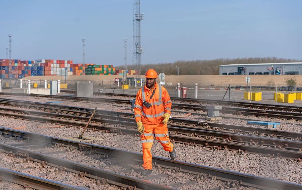 London design agency GBRf Photography Person uniform on railway